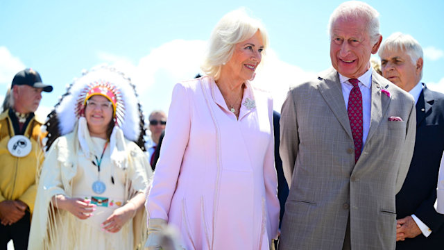 King Charles and Queen Camilla smiling at their Canada tour