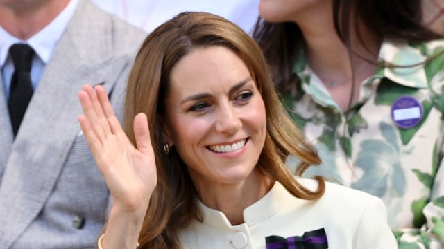 Kate Middleton waving to a crowd