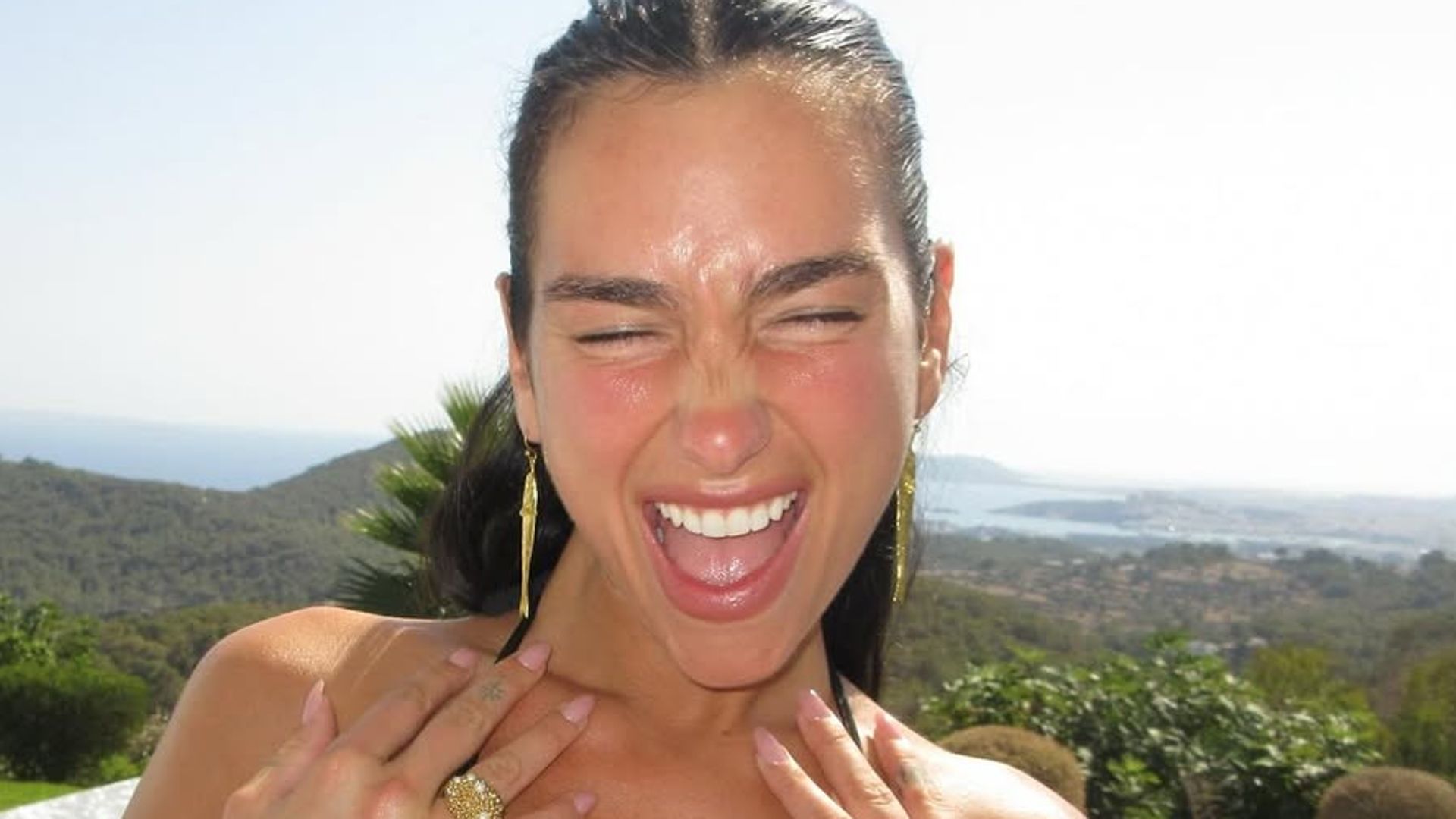 Dua Lipa celebrating in Ibiza