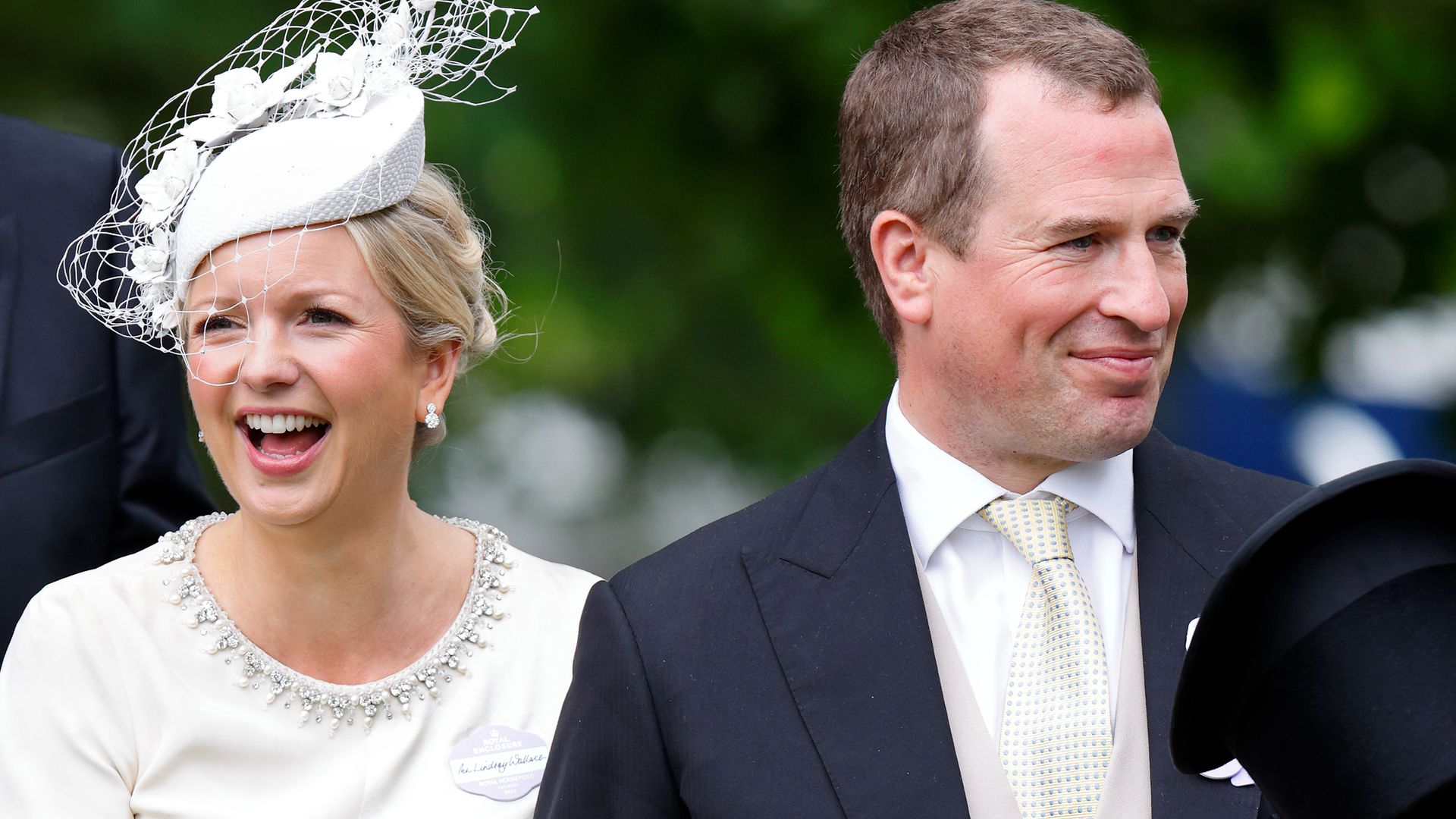 Lindsay Wallace is gorgeous in a white fascinator and dress as she joins Peter Phillips at Royal Ascot