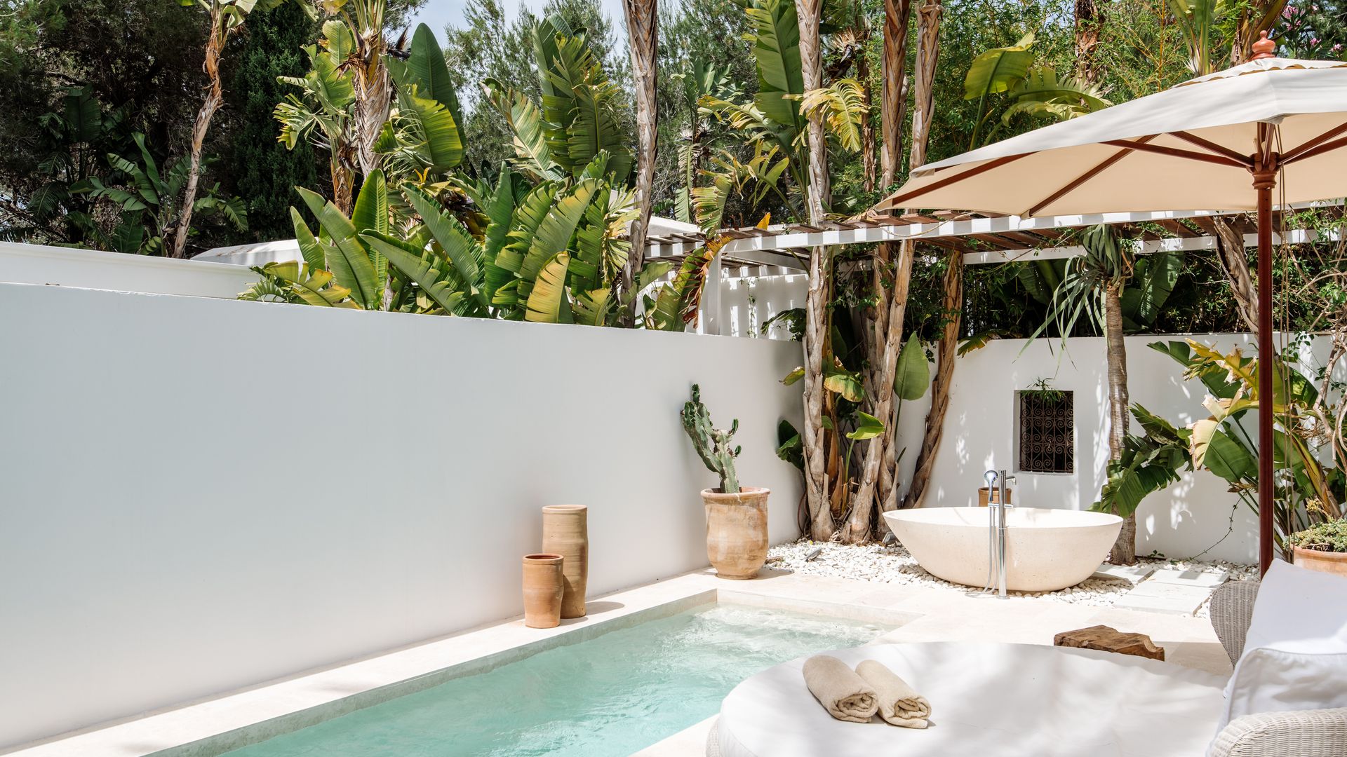 Ibiza’s Atzaró Agroturismo Hotel private pool with outdoor bath and loungers