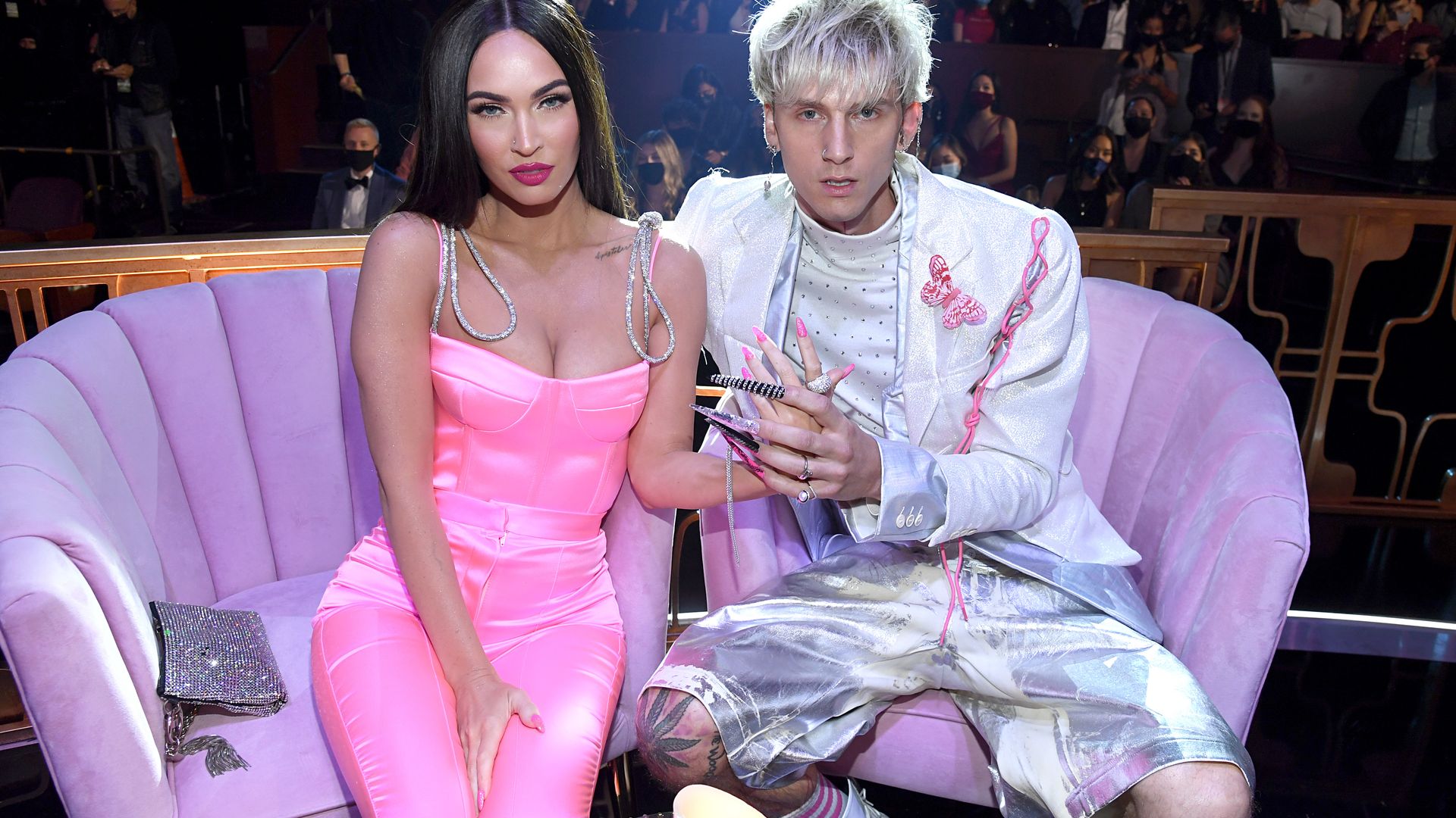LOS ANGELES, CALIFORNIA - MAY 27: (EDITORIAL USE ONLY) (L-R) Megan Fox and Machine Gun Kelly attend the 2021 iHeartRadio Music Awards at The Dolby Theatre in Los Angeles, California, which was broadcast live on FOX on May 27, 2021. (Photo by Kevin Mazur/Getty Images for iHeartMedia)