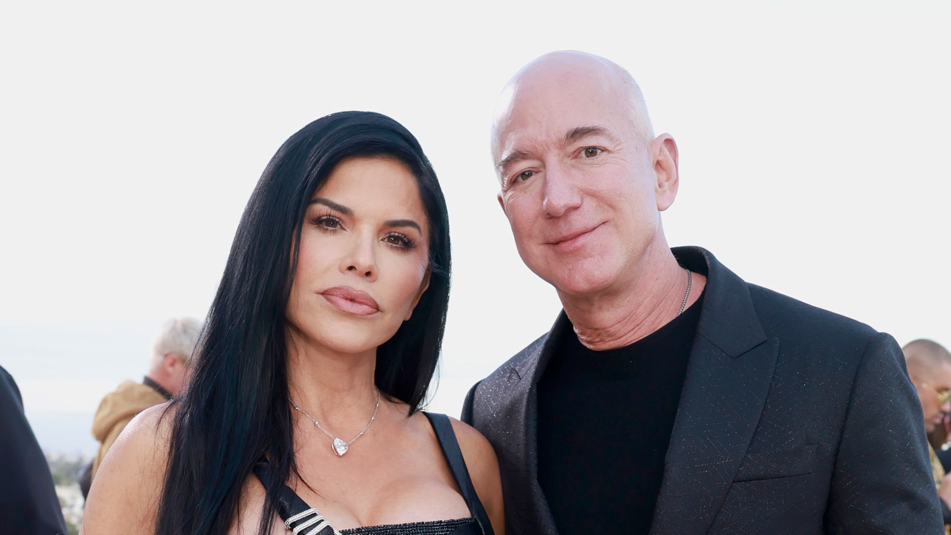 Lauren SÃ¡nchez and Jeff Bezos attend the Versace FW23 Show at Pacific Design Center on March 09, 2023 in West Hollywood, California.