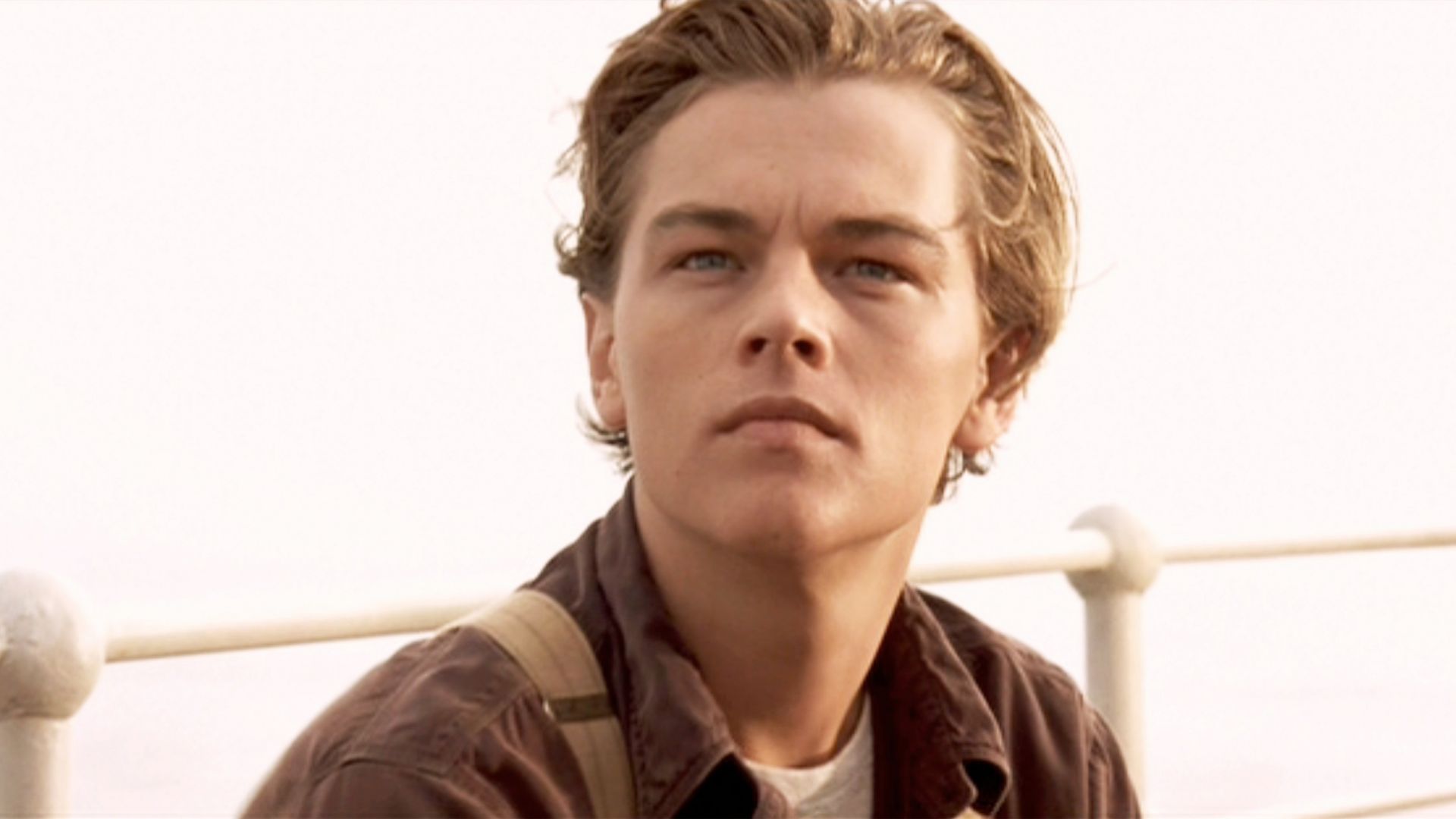 The movie "Titanic", written and directed by James Cameron. Seen here, Leonardo DiCaprio as Jack Dawson. Initial USA theatrical wide release December 19, 1997. Screen capture. Paramount Pictures.