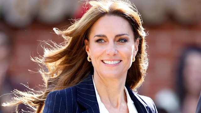 Kate Middleton wearing a navy blue suit as she visits the Grange Pavilion to meet with members of the Windrush Cymru Elders, Black History Cymru 365 and the Ethnic Minority Youth Forum for Wales as she celebrates the beginning of Black History Month on October 3, 2023 in Cardiff, Wales. In celebration of the 75th anniversary of the arrival of HMT Empire Windrush, the Prince and Princess of Wales are meeting members of the Windrush generation in Cardiff. 