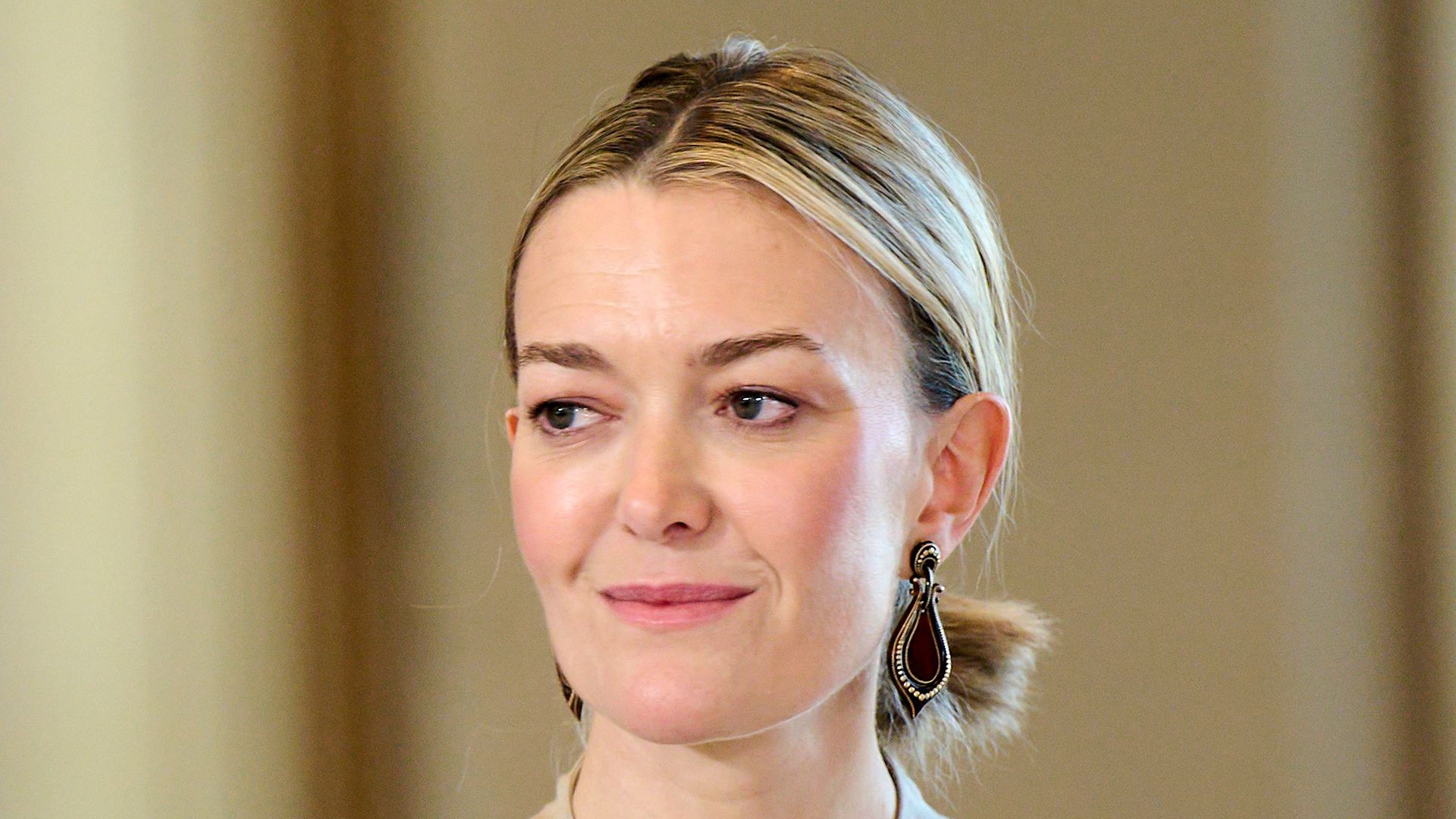 Marta Ortega Perez in a cream outfit