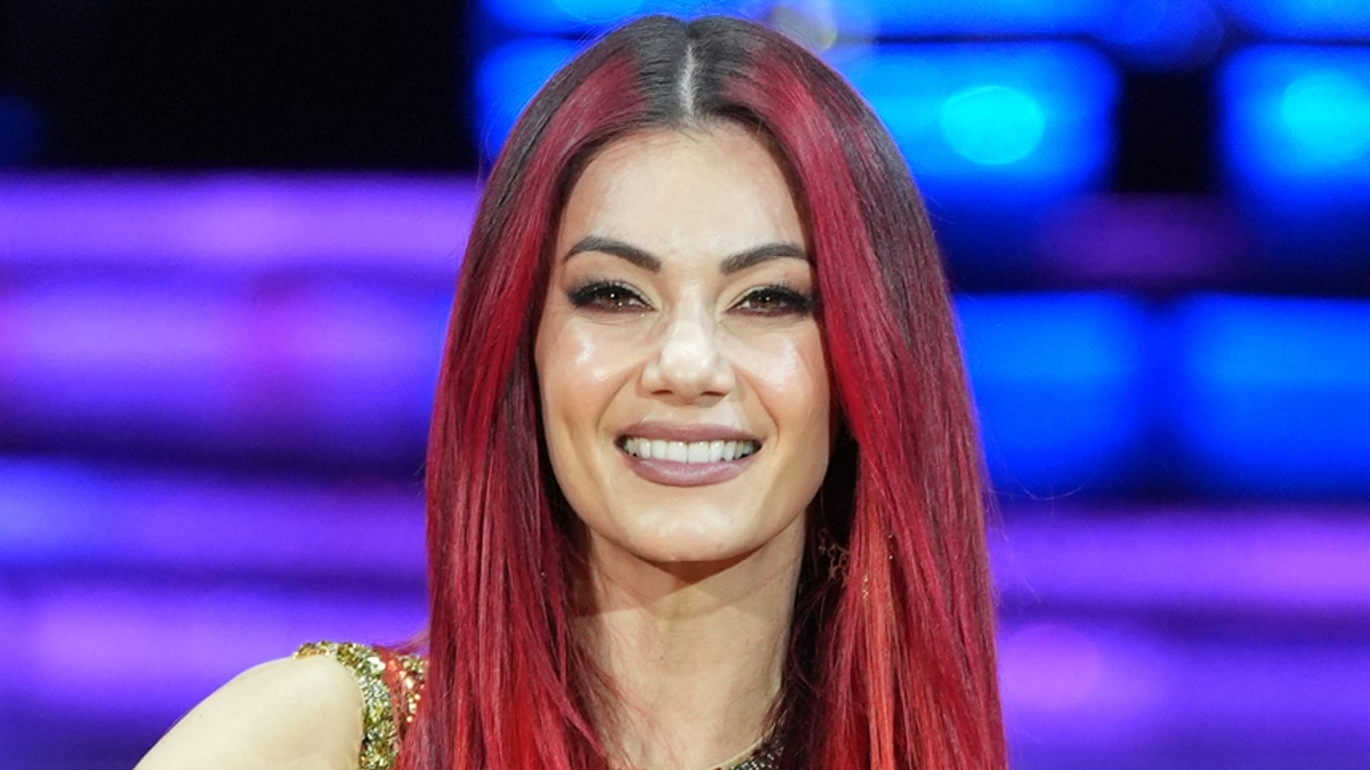 Dianne Buswell in gold mini dress