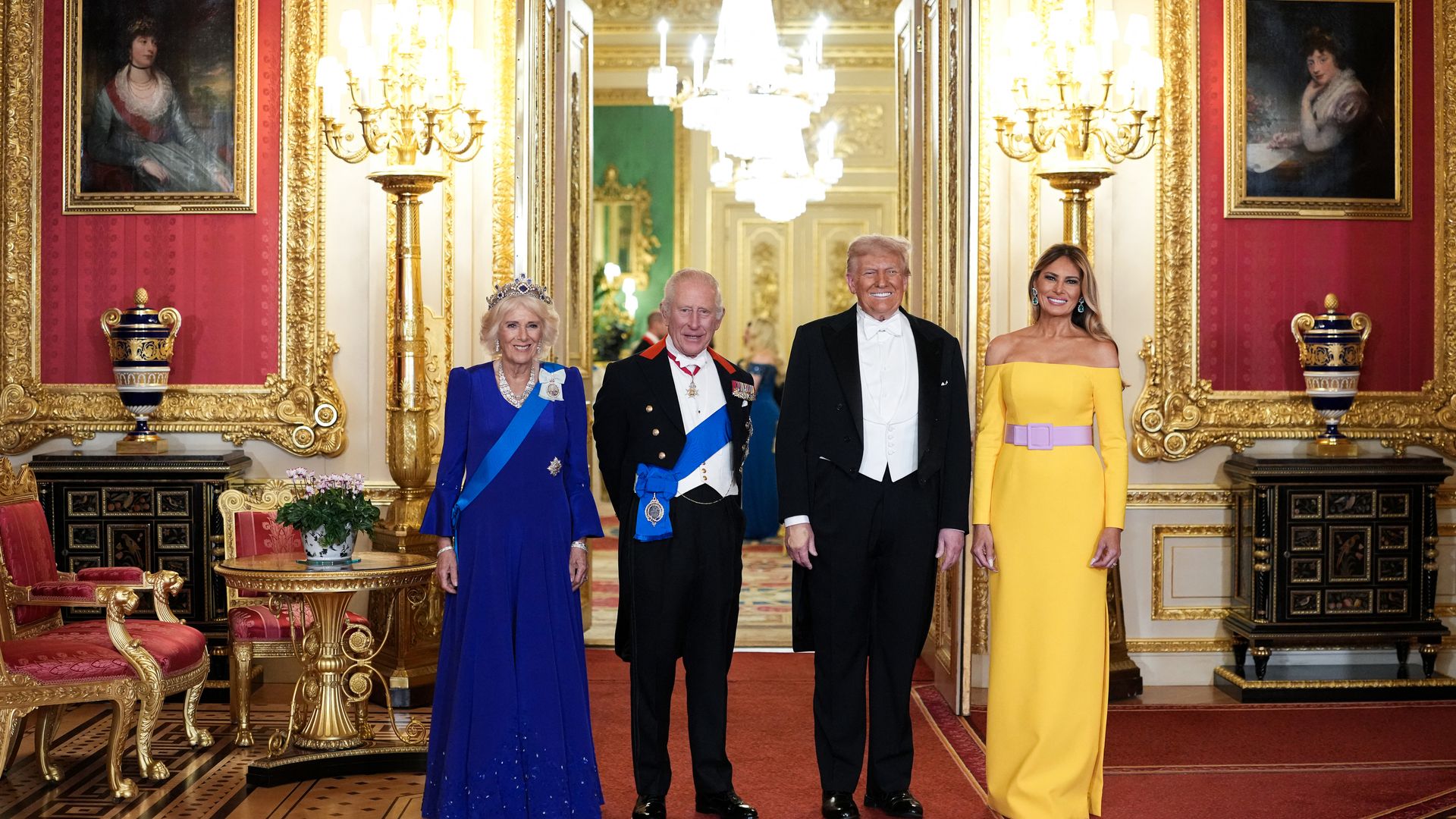 Britain's Queen Camilla, Britain's King Charles III, US President Donald Trump and US First Lady Melania Trump pose for a photo as they attend a State Banquet at Windsor Castle, in Windsor, on September 17, 2025, during the US President's second State Visit. US President Donald Trump arrived in Britain for an unprecedented second State Visit, with the UK government rolling out a royal red carpet welcome to win over the mercurial leader.