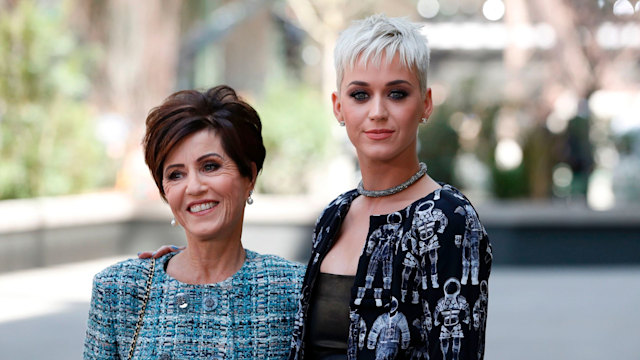 Katy Perry and her mother Mary pose during the photocall before Chanel 2017-2018 fall/winter Haute Couture collection show in Paris on July 4, 2017