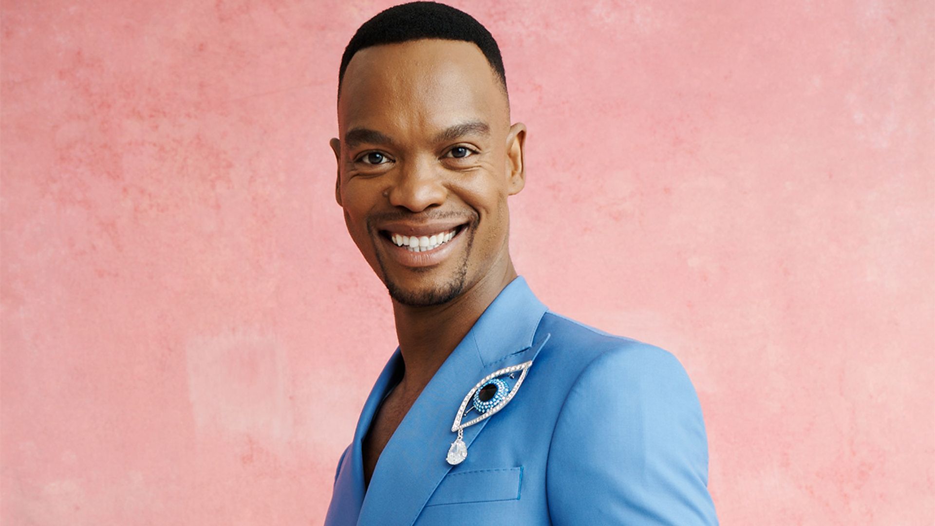 Strictly Come Dancing's Johannes Radebe wears a blue suit
