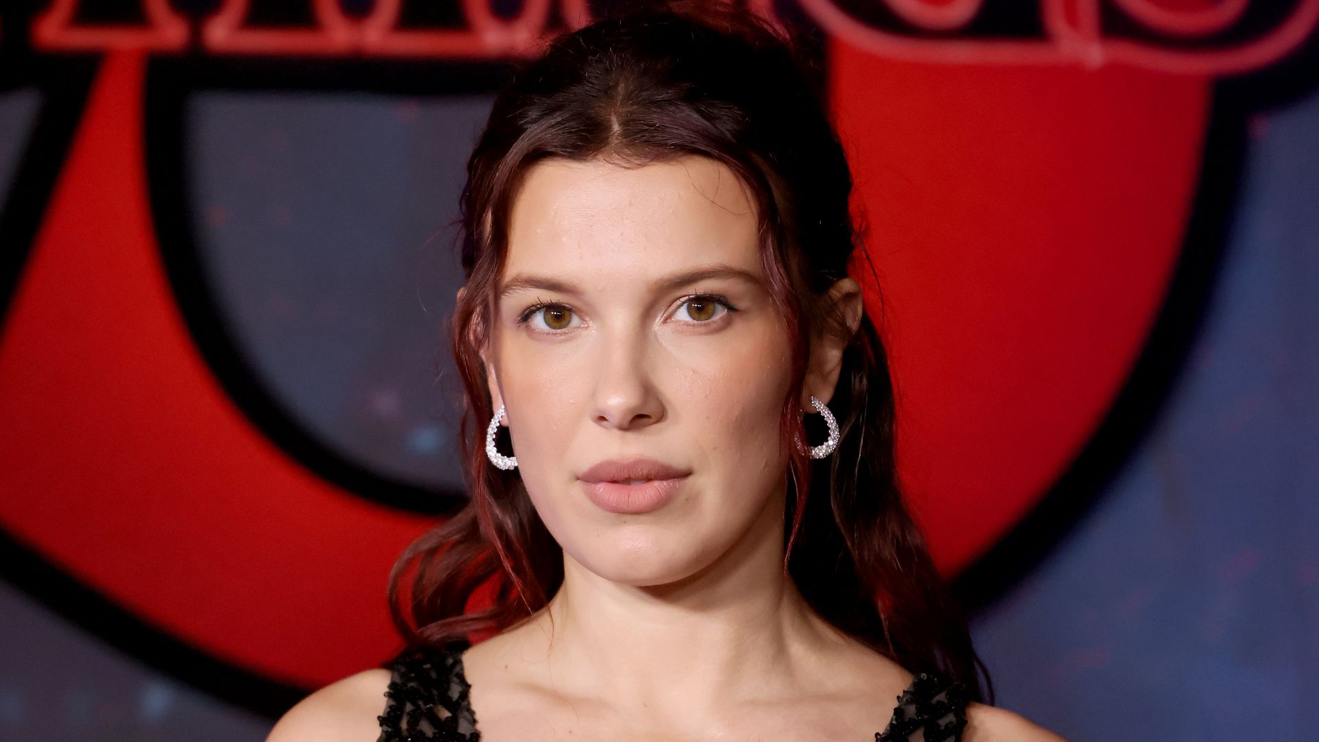 Millie Bobby Brown red carpet stranger things, glamorous dress
