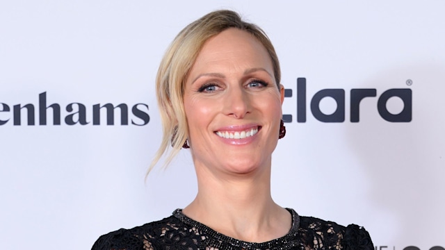 Zara Tindall smiling in black dress