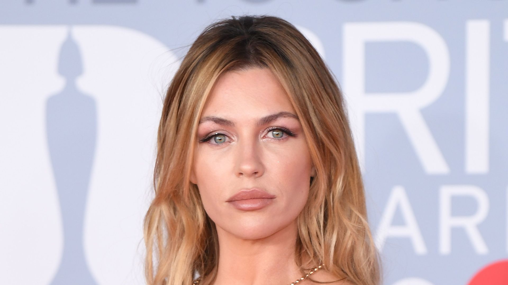 Abbey Clancy is a bronzed goddess in strappy bikini | HELLO!