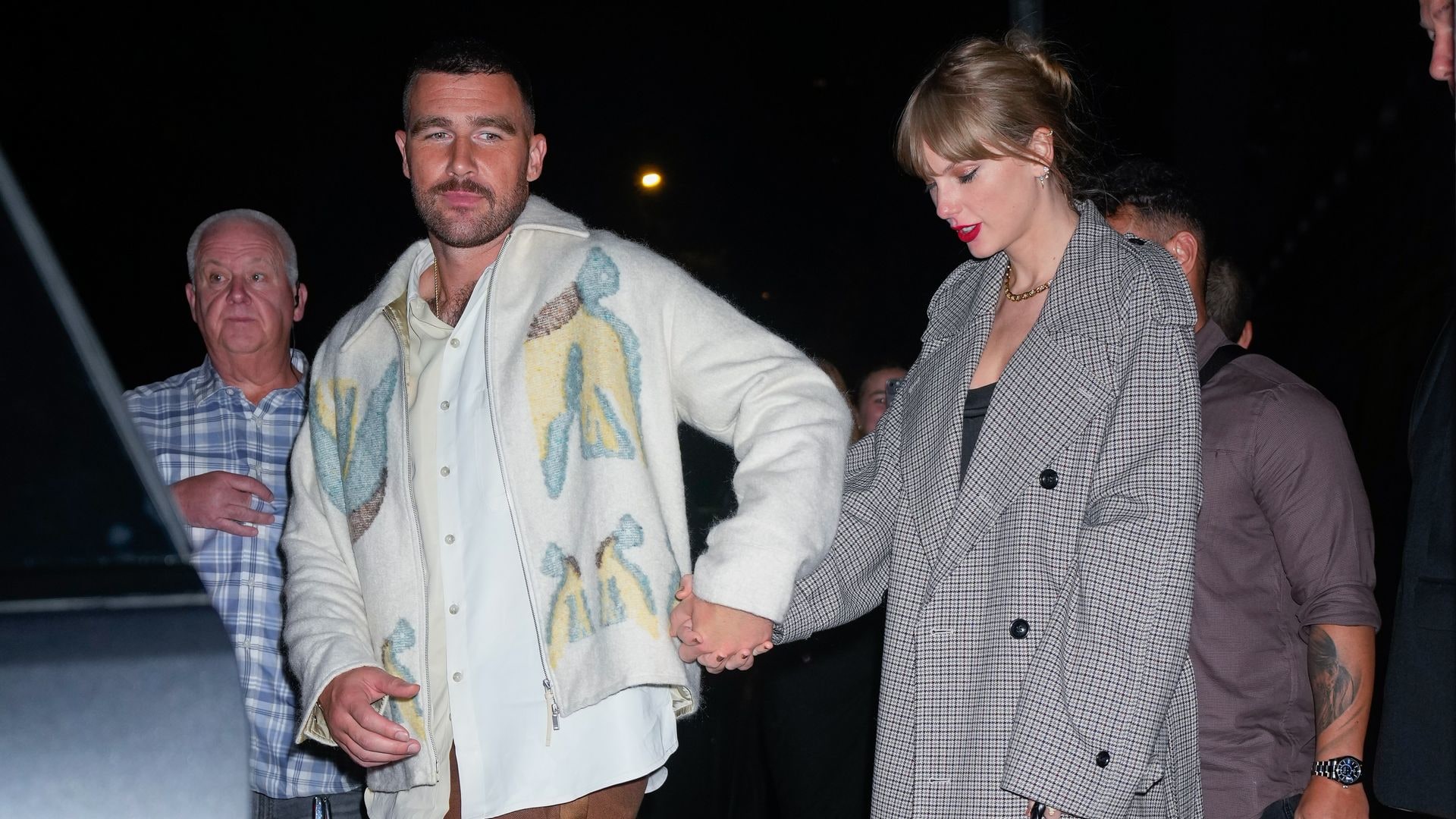 NEW YORK, NEW YORK - OCTOBER 15: Travis Kelce and Taylor Swift depart the SNL Afterparty on October 15, 2023 in New York City. (Photo by Gotham/GC Images)