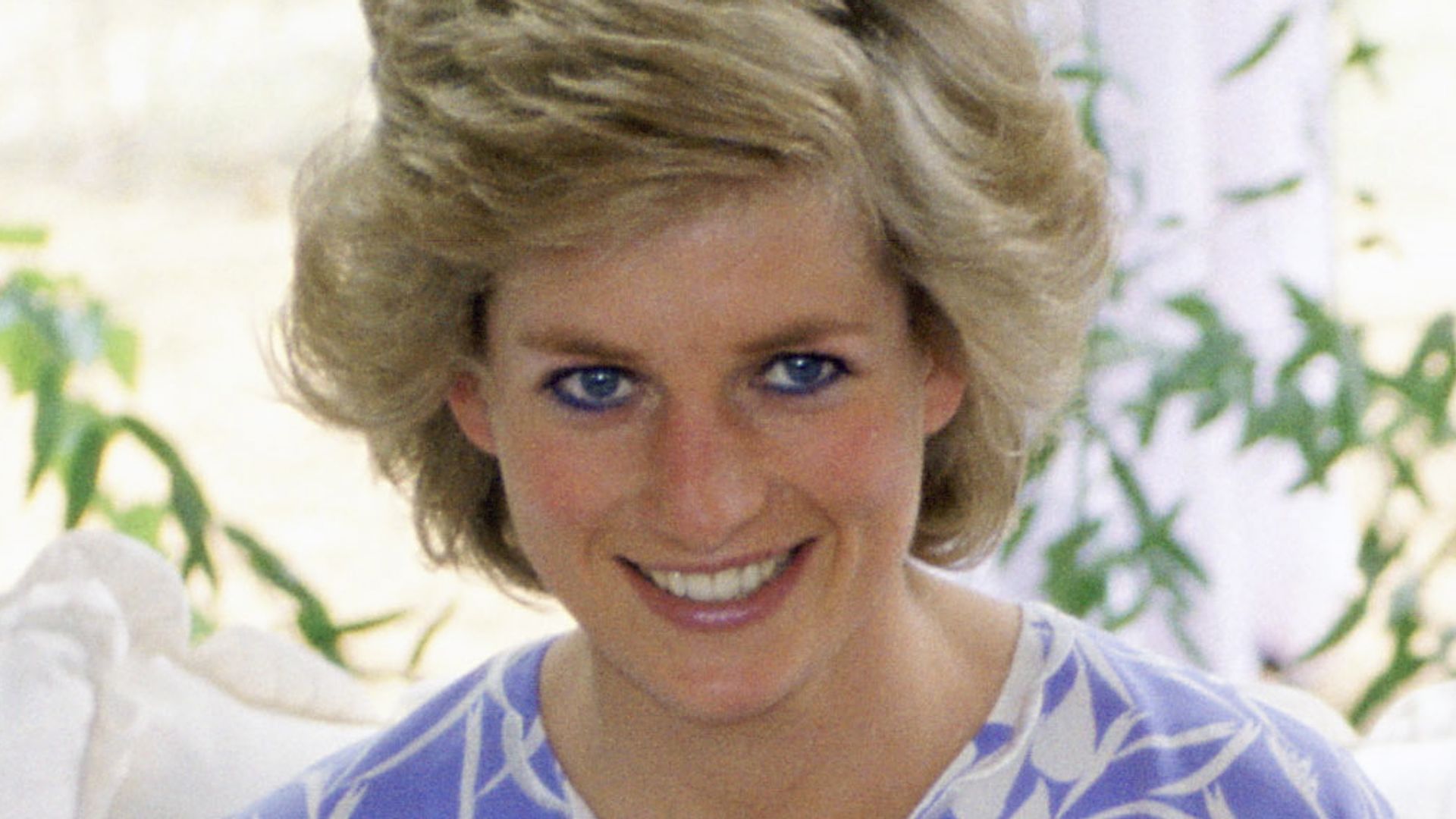 ABU DHABI, UNITED ARAB EMIRATES - MARCH 15:  The Prince And Princess Of Wales Laughing Together During A Desert Picnic In Adu Dhabi  (Photo by Tim Graham Photo Library via Getty Images)