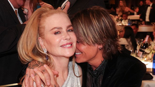 nicole kidman smiling keith urban with arms around her shoulders