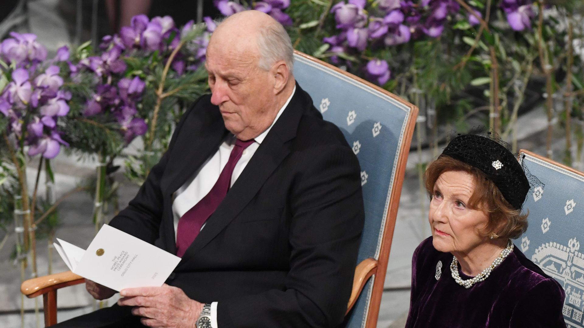 King Harald and Queen Sonja in black at the Nobel Peace Prize