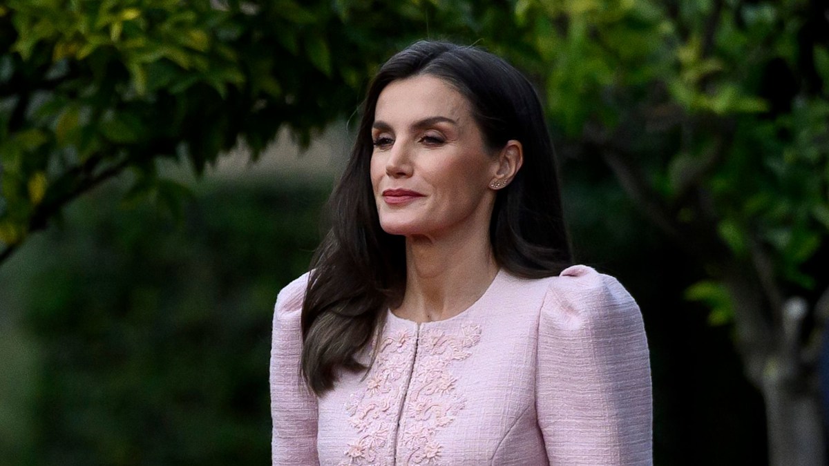 Queen Letizia stuns in bridal white shirt and waist-cinching skirt