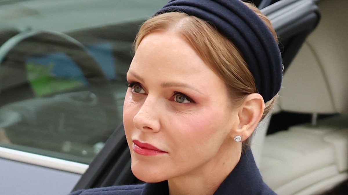 Princess Charlene is angelic in crispest white coat