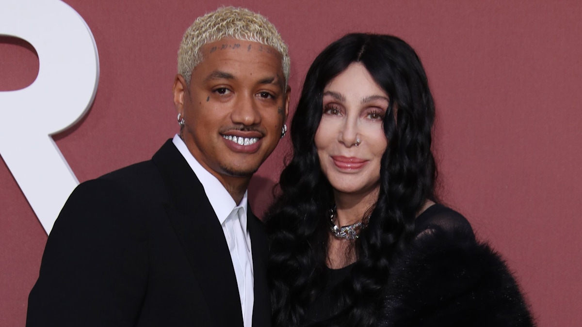 Cher can't keep her hands off boyfriend Alexander Edwards as she ...