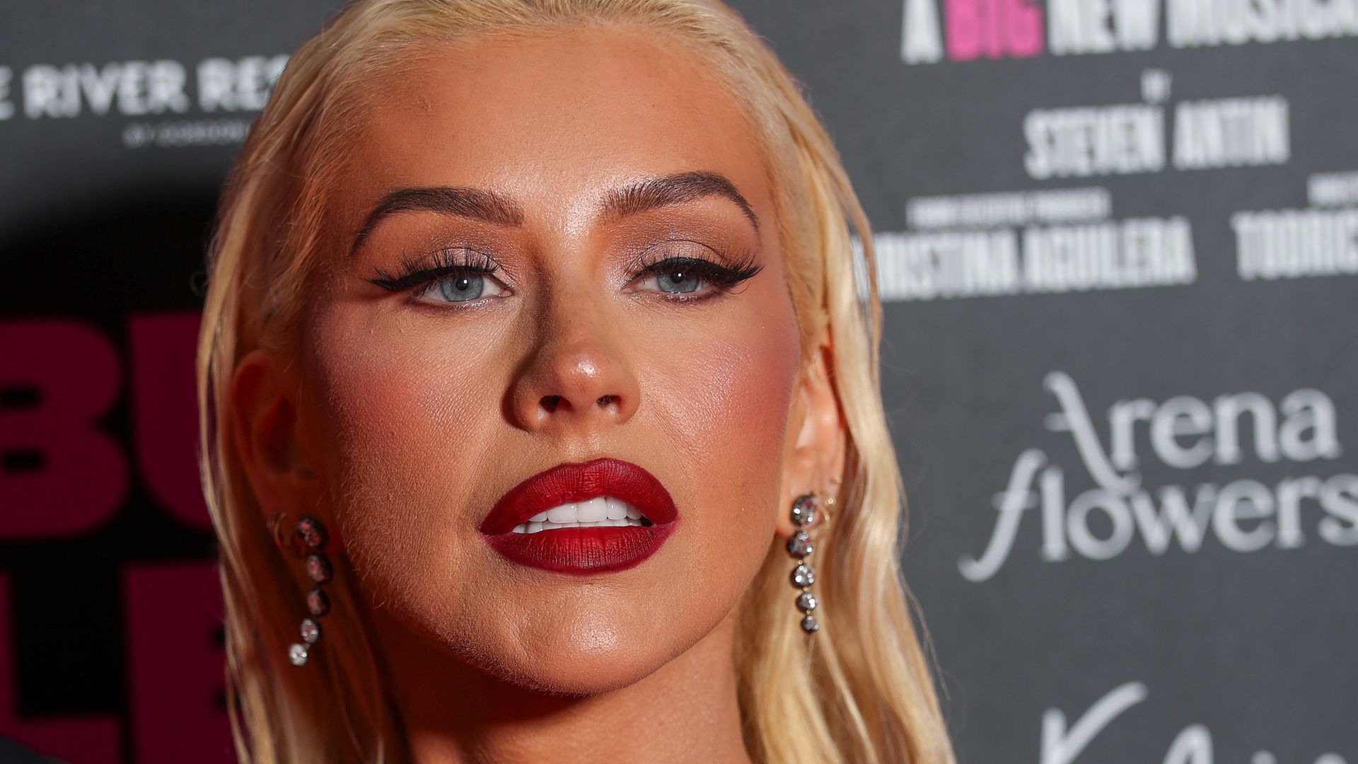 Christina Aguilera recreates 2002 look in skintight leather bodysuit and chaps