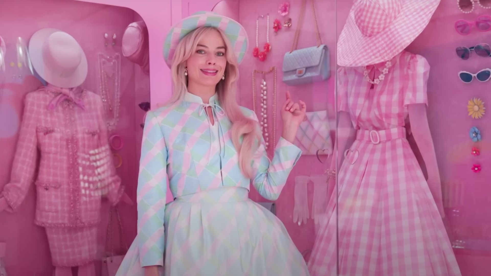 Margot Robbie stands in Barbie's pink Chanel wardrobe