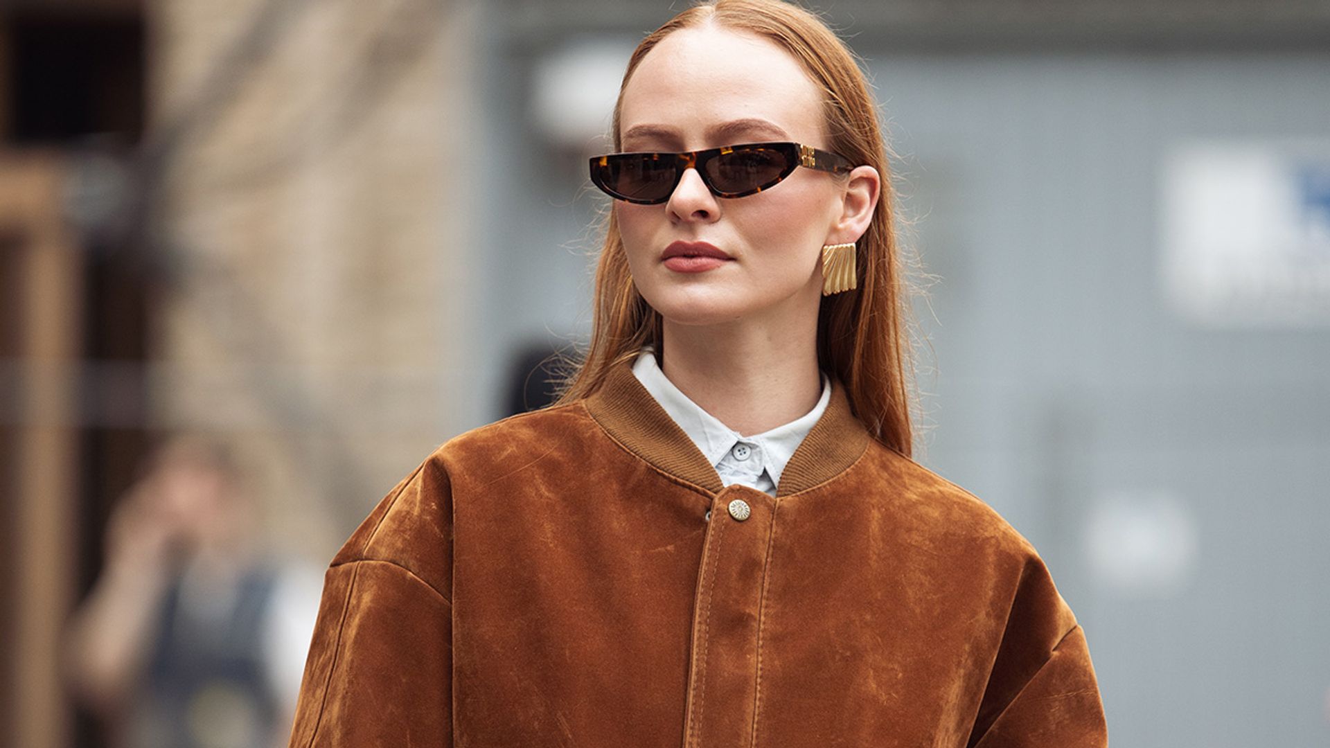 Woman wearing suede jacket