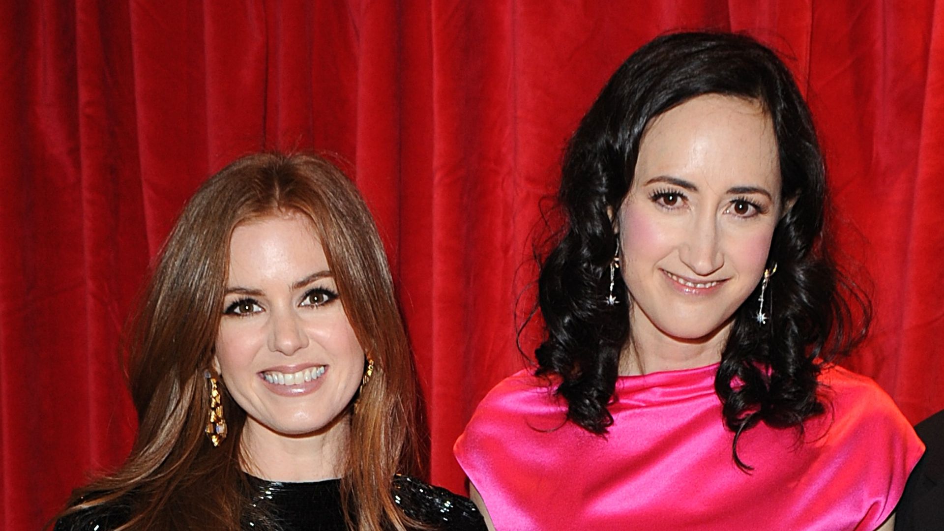 Star of the film Isla Fisher, the book's author Sophie Kinsella and producer Jerry Bruckheimer arrive at the UK premiere of 'Confessions of a Shopaholic' at the Empire Leicester Square in central London