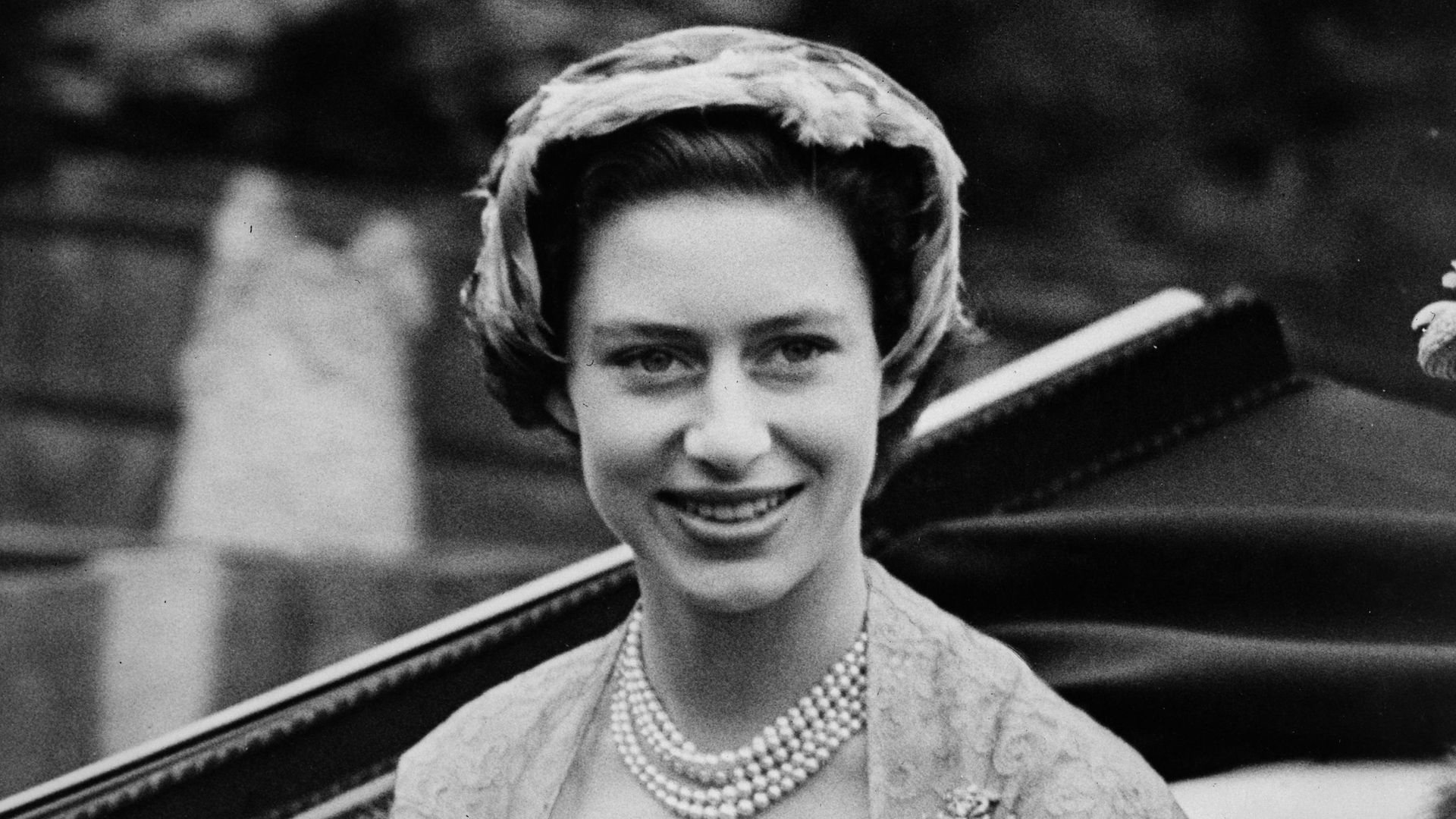 17th June 1952:  Princess Margaret (1930 - 2002) is driven to the opening meeting of the Royal Ascot horse-racing event near Windsor in Berkshire.  (Photo by Fox Photos/Getty Images)