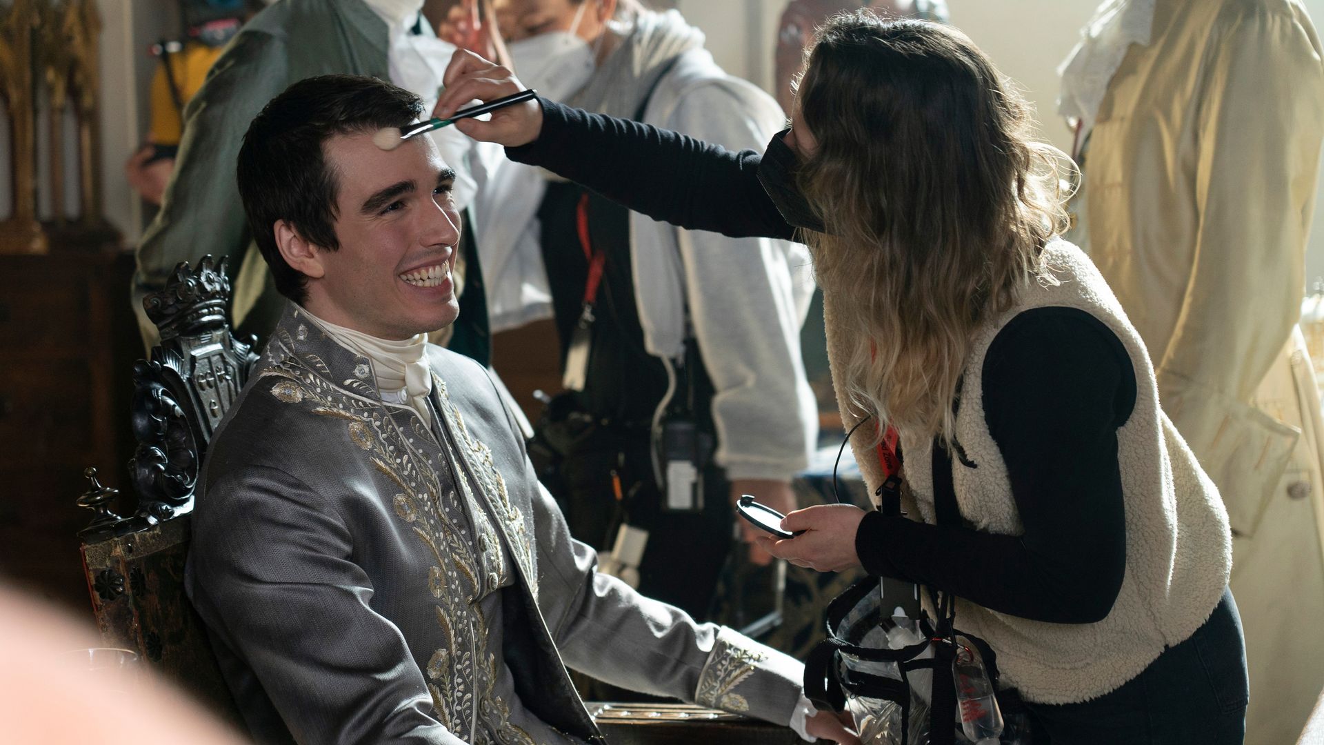 Corey Mylchreest getting his makeup done on the set of Queen Charlotte. 