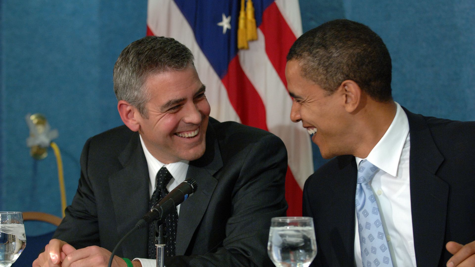 George Clooney (L) and Senator Barack Obama (D - Illinois) during a press conference in Washington DC, where Clooney spoke about his recent visit to the Darfur region of Sudan, on April 27, 2006