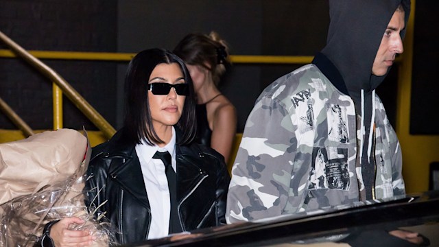 NEW YORK, NEW YORK - SEPTEMBER 13: Kourtney Kardashian and Travis Barker are seen leaving the Boohoo X Kourtney Kardashian fashion show during New York Fashion Week on the High Line on September 13, 2022 in New York City. (Photo by Gilbert Carrasquillo/GC Images)