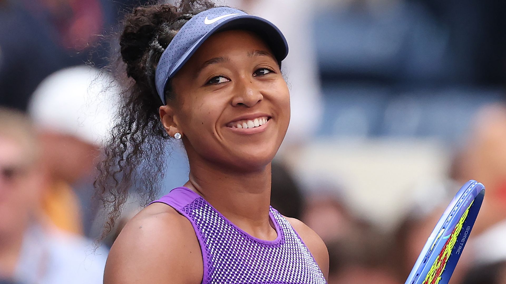 Naomi Osaka celebrates after defeating Coco Gauff 