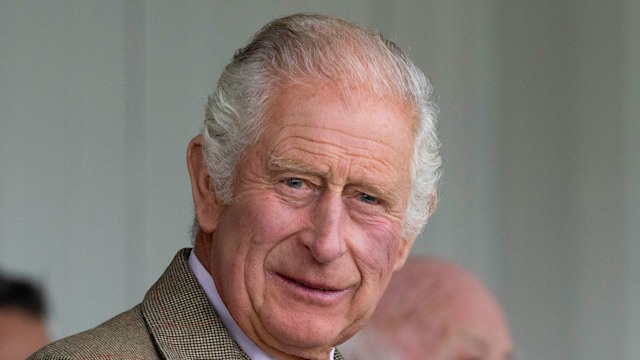 king charles smiling in tweed jacket at mey highland games