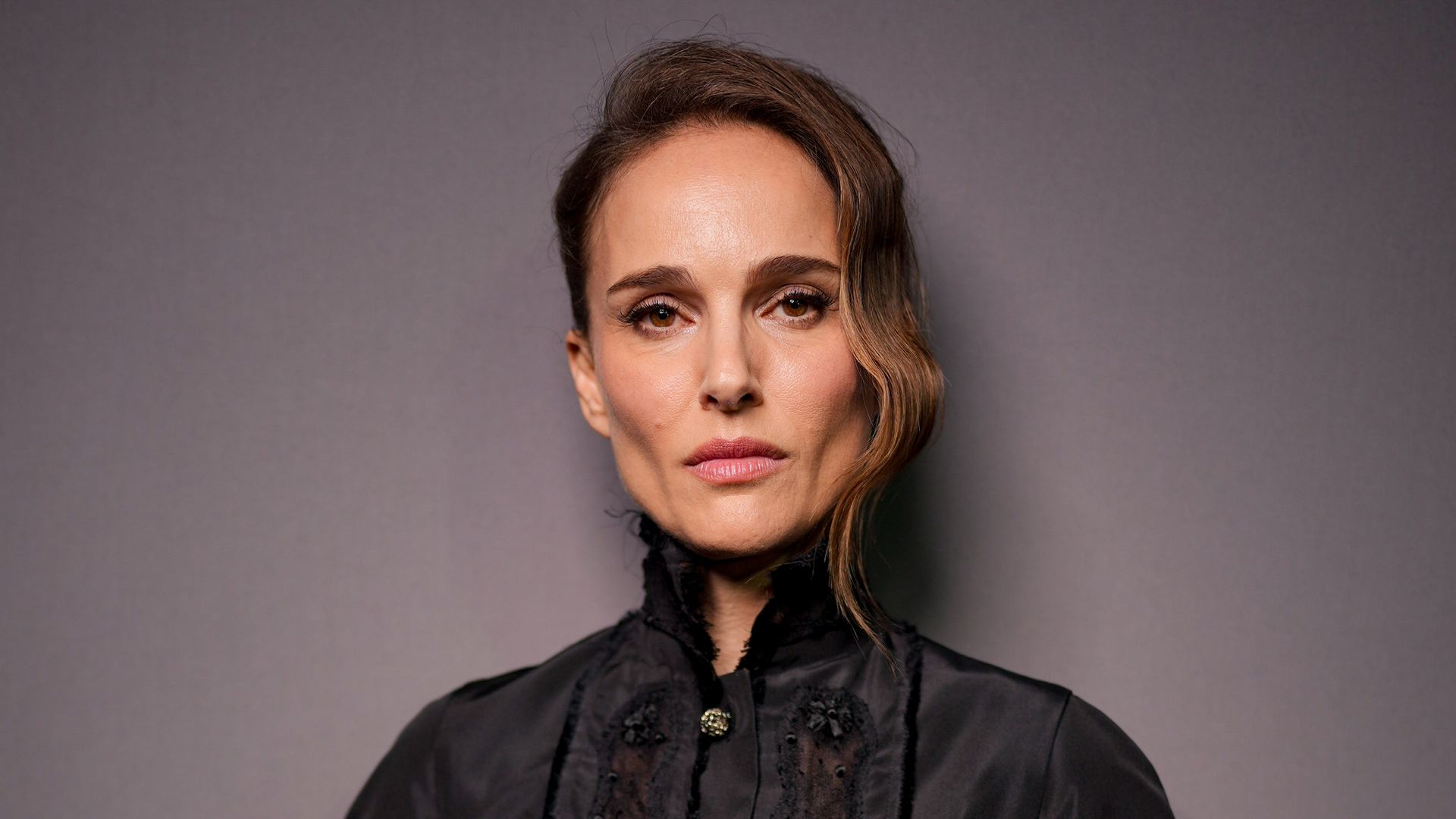 Natalie Portman wows in edgy knee-high socks, heels and sheer mini-dress for Paris Fashion Week