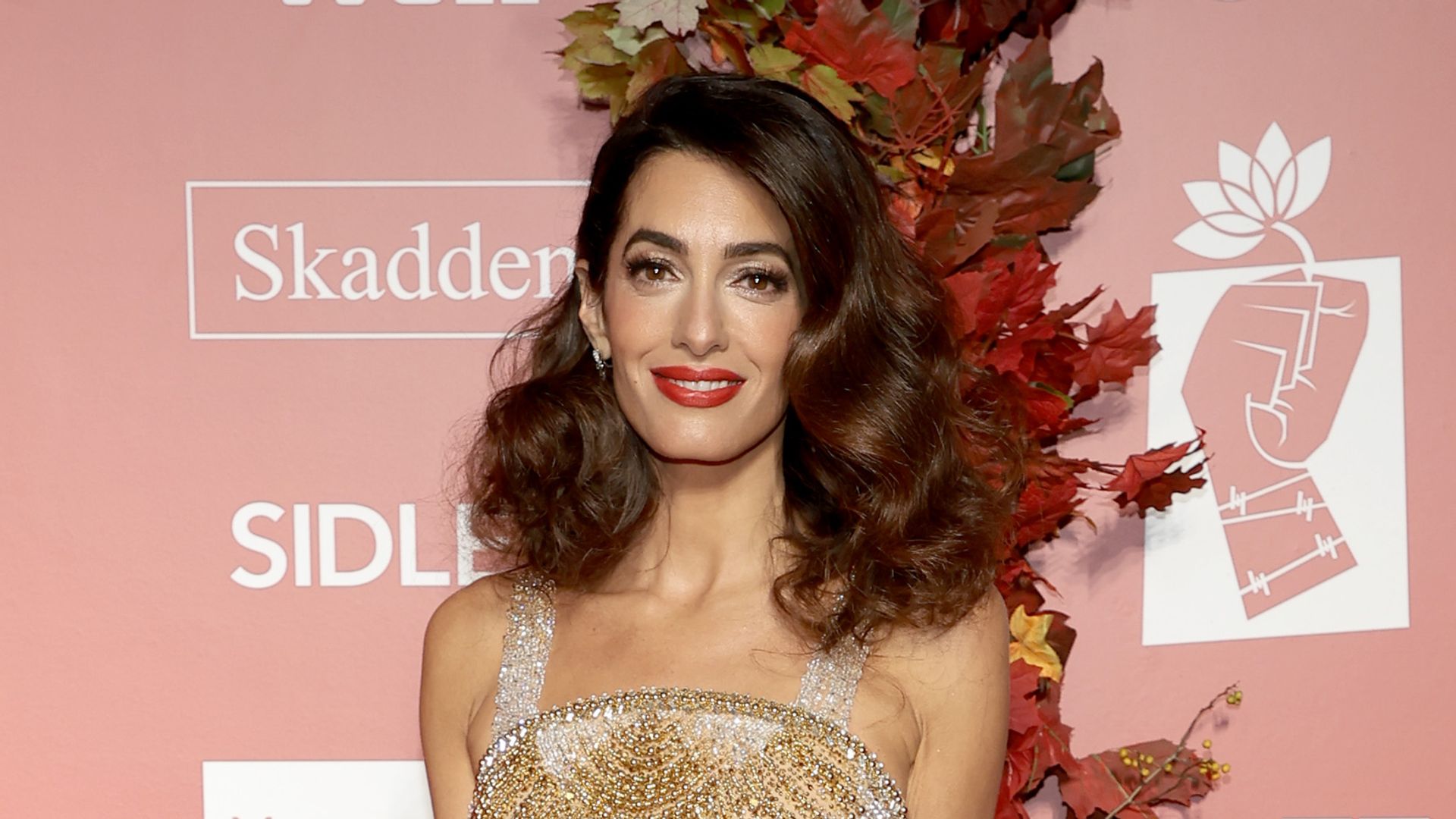 amal clooney gold and silver dress red carpet
