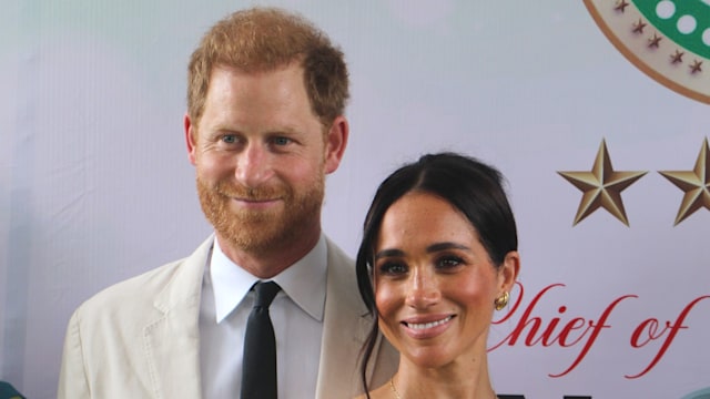 Meghan Markle pose for a photo as they attend the program held in the Armed Forces Complex in Abuja