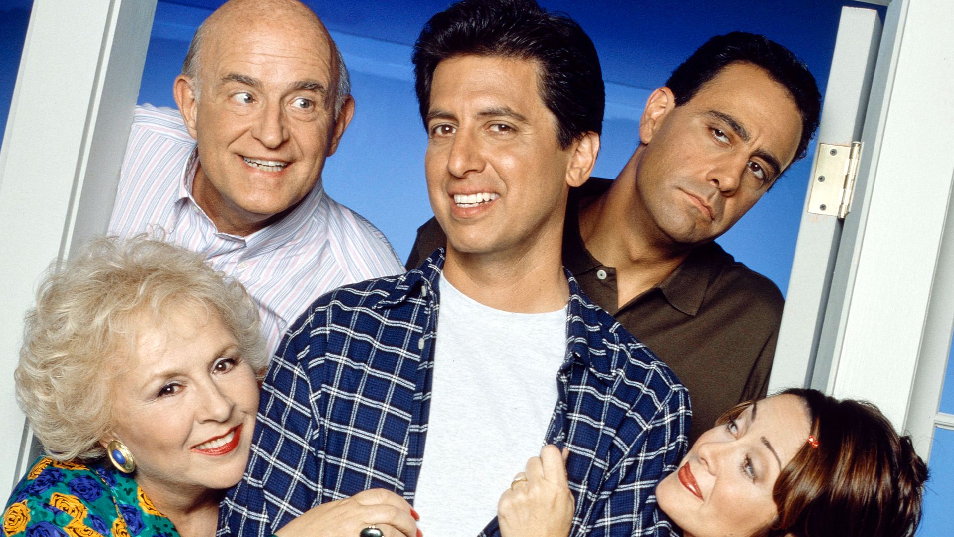 From left is Doris Roberts (as Marie Barone), Peter Boyle (as Frank Barone), Ray Romano (as Ray Barone), Brad Garrett (as Robert Barone), Patricia Heaton (as Debra Barone) on Everybody Loves Raymond, 1996