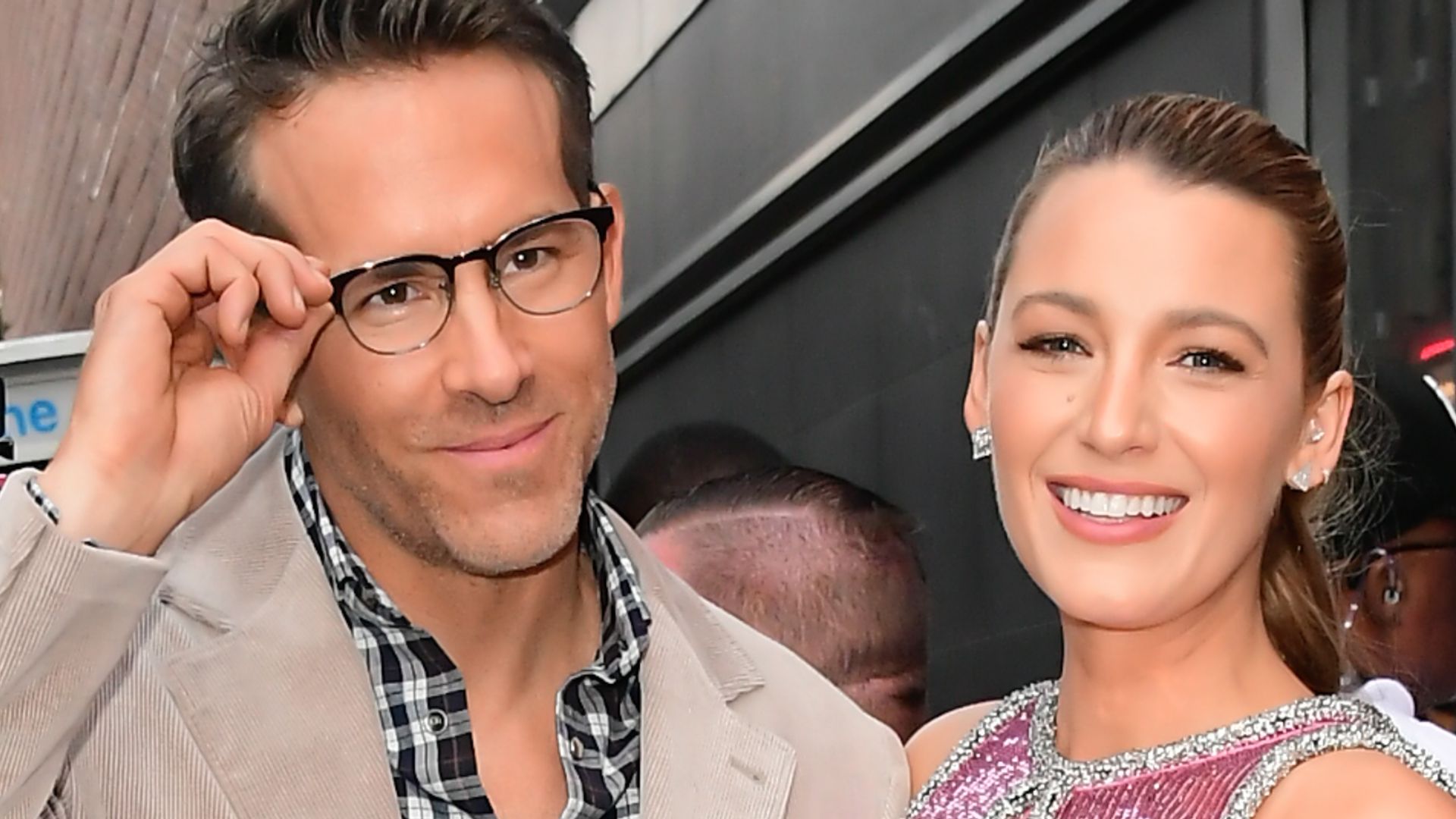 Blake Lively in pink sequin dress and Ryan Reynolds smiling