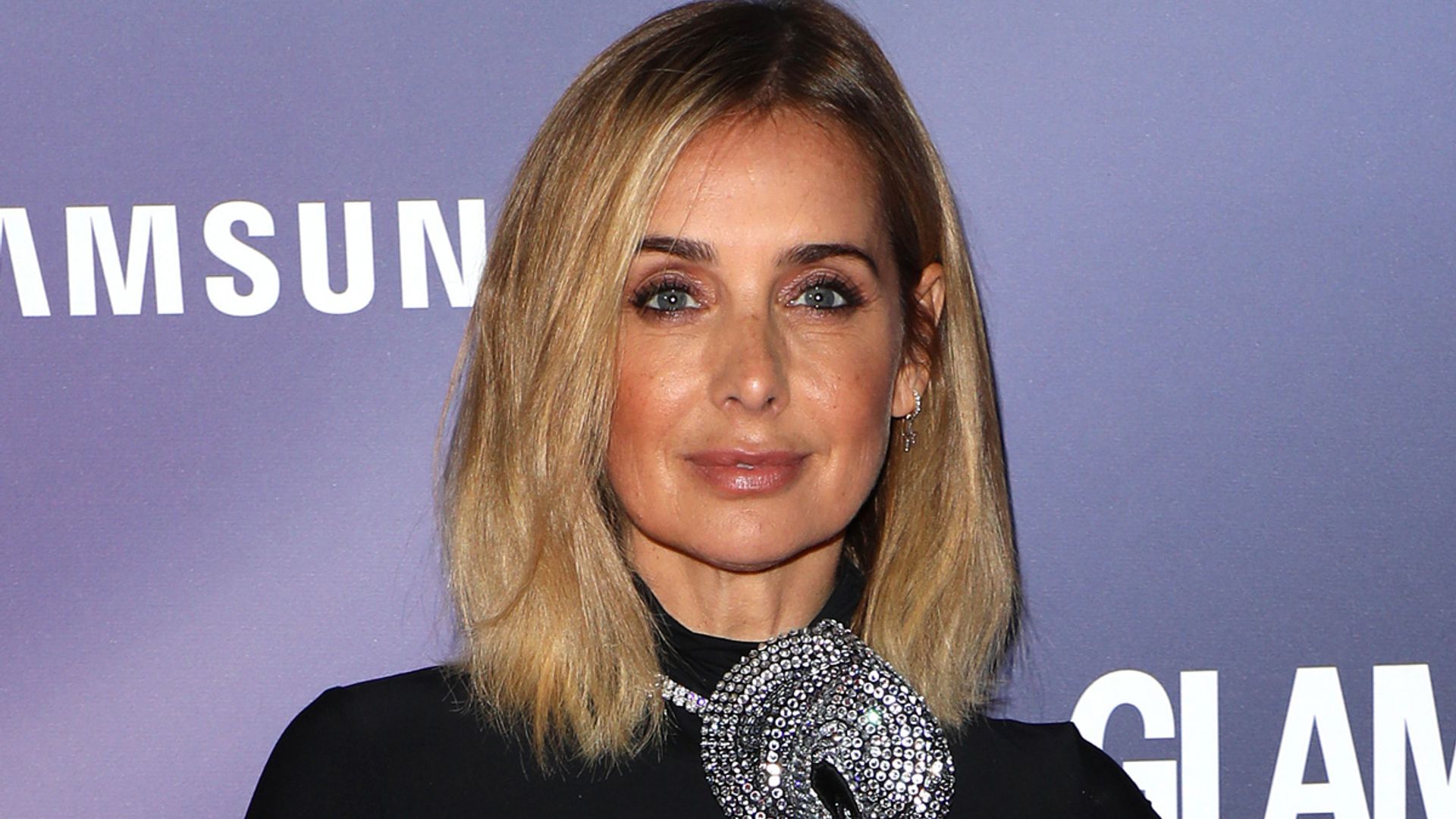 Louise Redknapp teases career news in boyfriend jeans and retro top