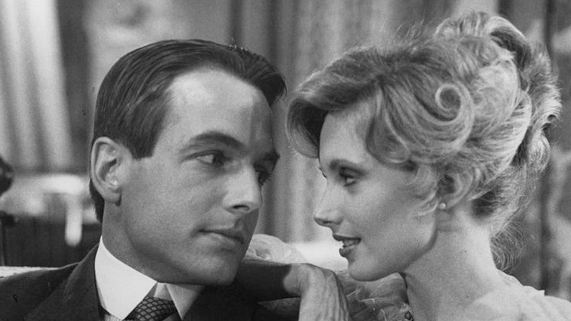 Mark Harmon looking into the eyes of Morgan Fairchild in a scene from the television movie 'The Dream Merchants', 1980