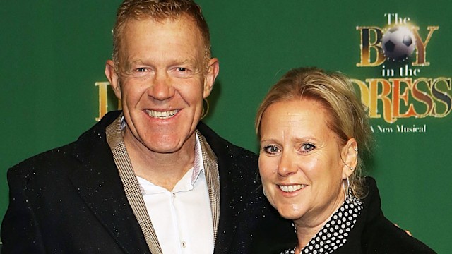 Adam Henson and his wife in matching black coats