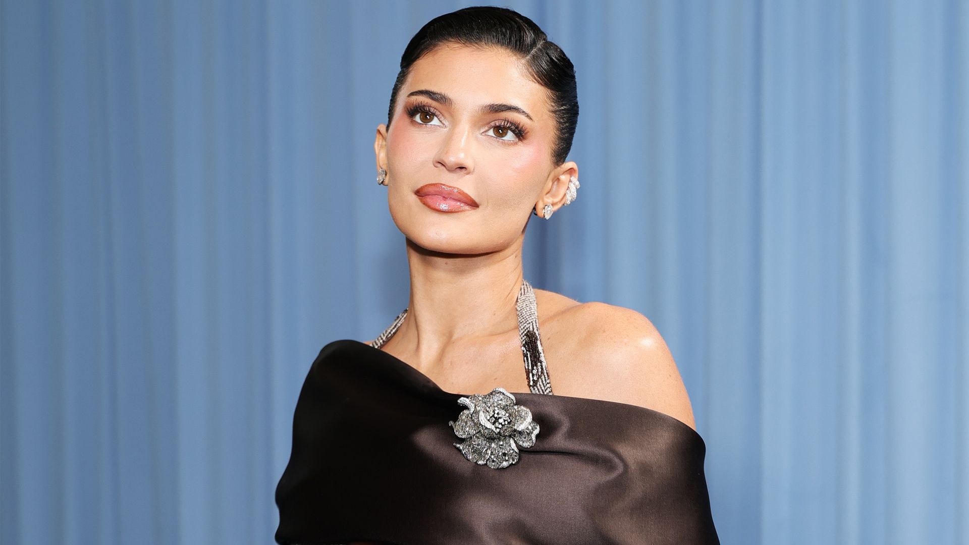 Kylie Jenner surprises in divisive bandage skirt for family reunion