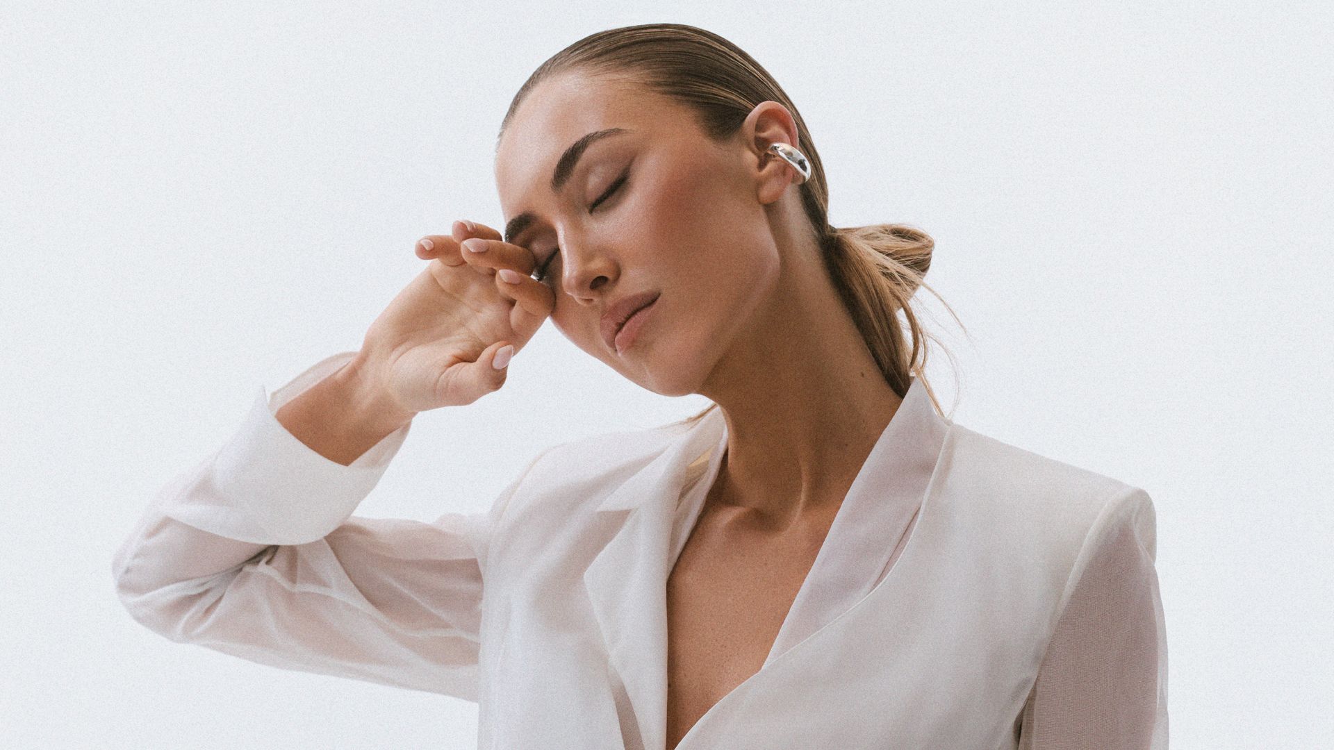 Top: Akris, £2150, Akris.
Blazer: Akris, £3420.
Trouser: Akris, £1510.
Earcuff: Paula Mendoza, £82.