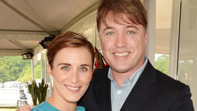 Vicky McClure in a blue dress with Jonny Owen in a suit