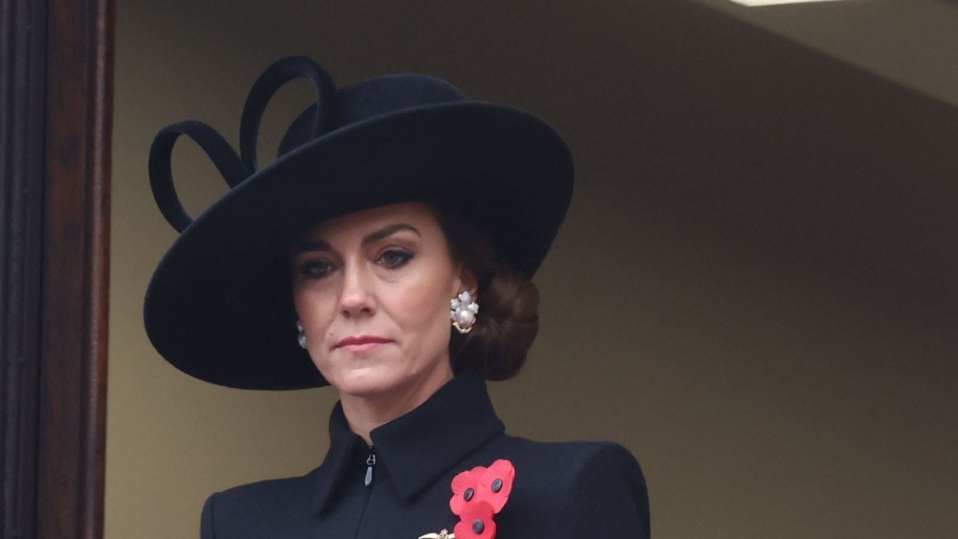Princess Kate wearing three poppies at the Cenotaph