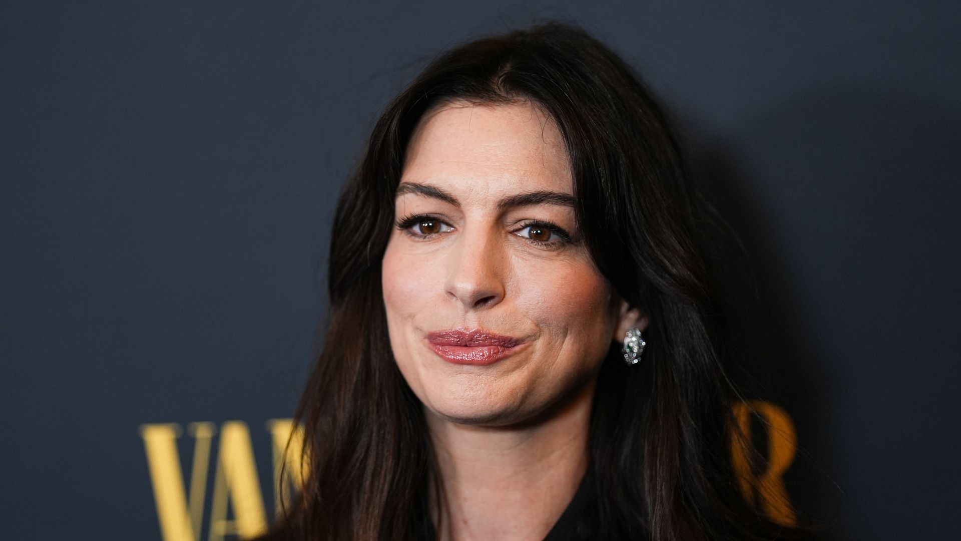 Anne Hathaway steals the spotlight in a semi-sheer dress at New York Fashion Week | HELLO!