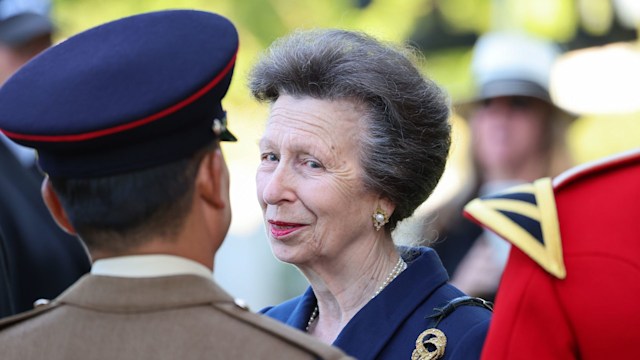 Anne, Princess Royal speaks with soldiers during a Royal British Legion service of commemoration