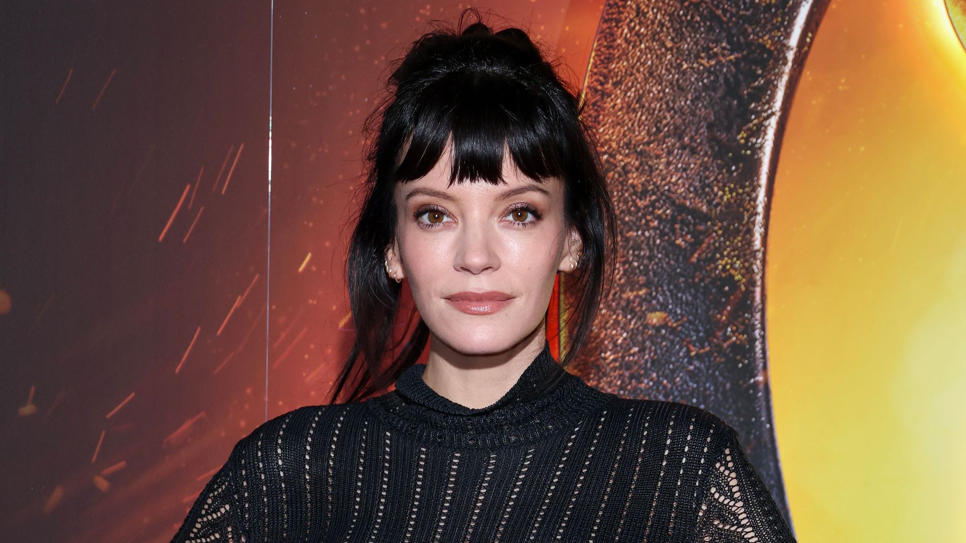 Lily Allen in black dress at The Hunger Games: On Stage The Global Stage Premiere 