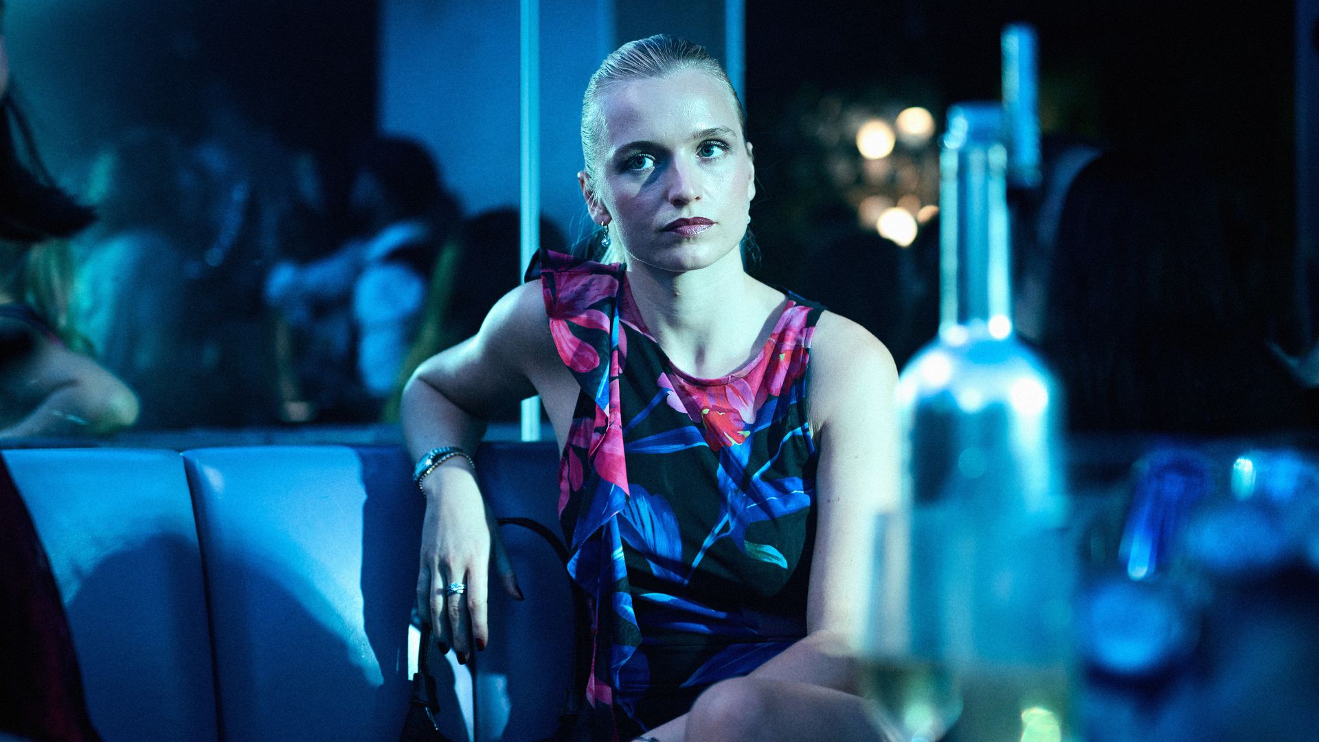 woman sitting in bar